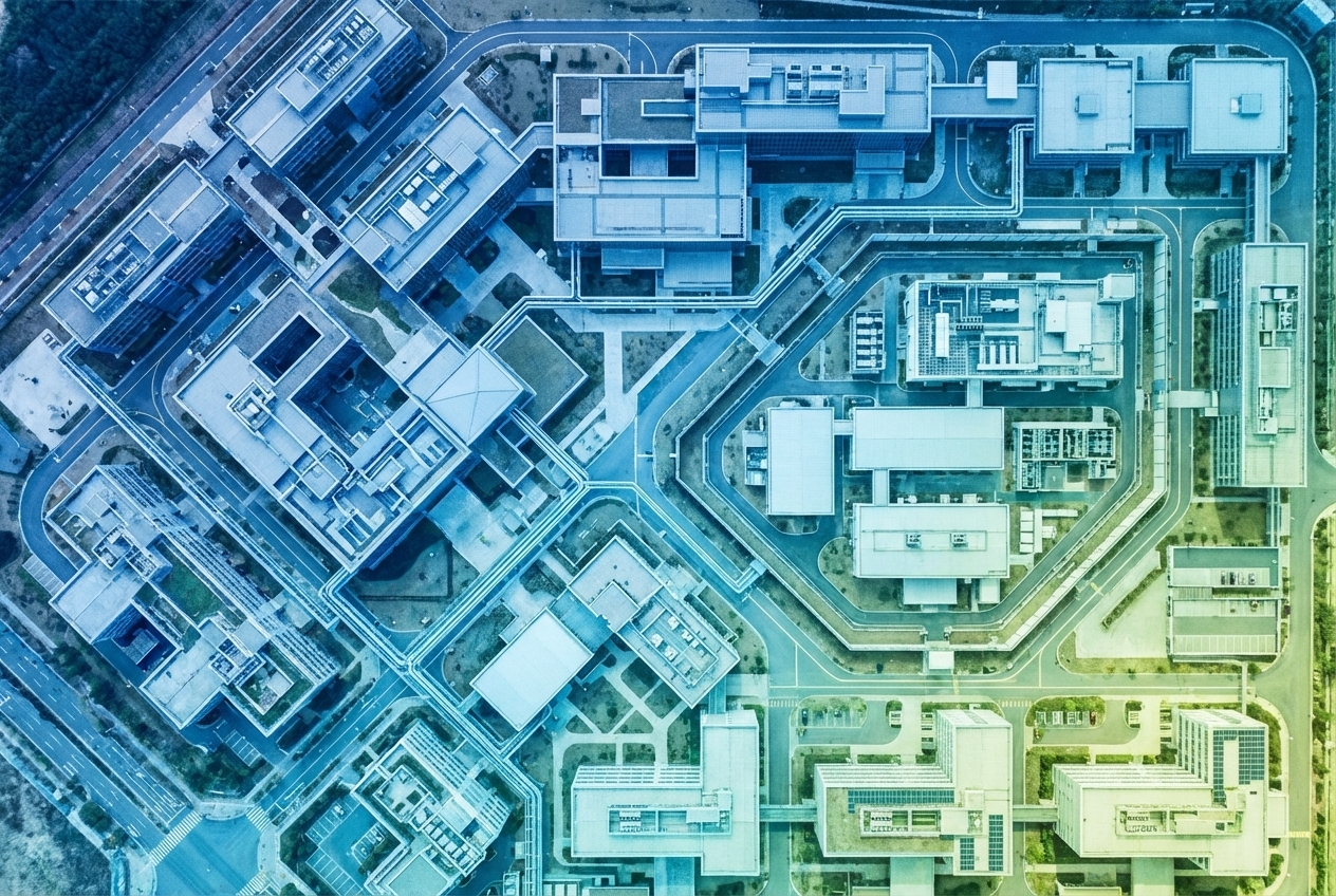 Aerial view of segmented infrastructure representing AI security microsegmentation across enterprise network zones
