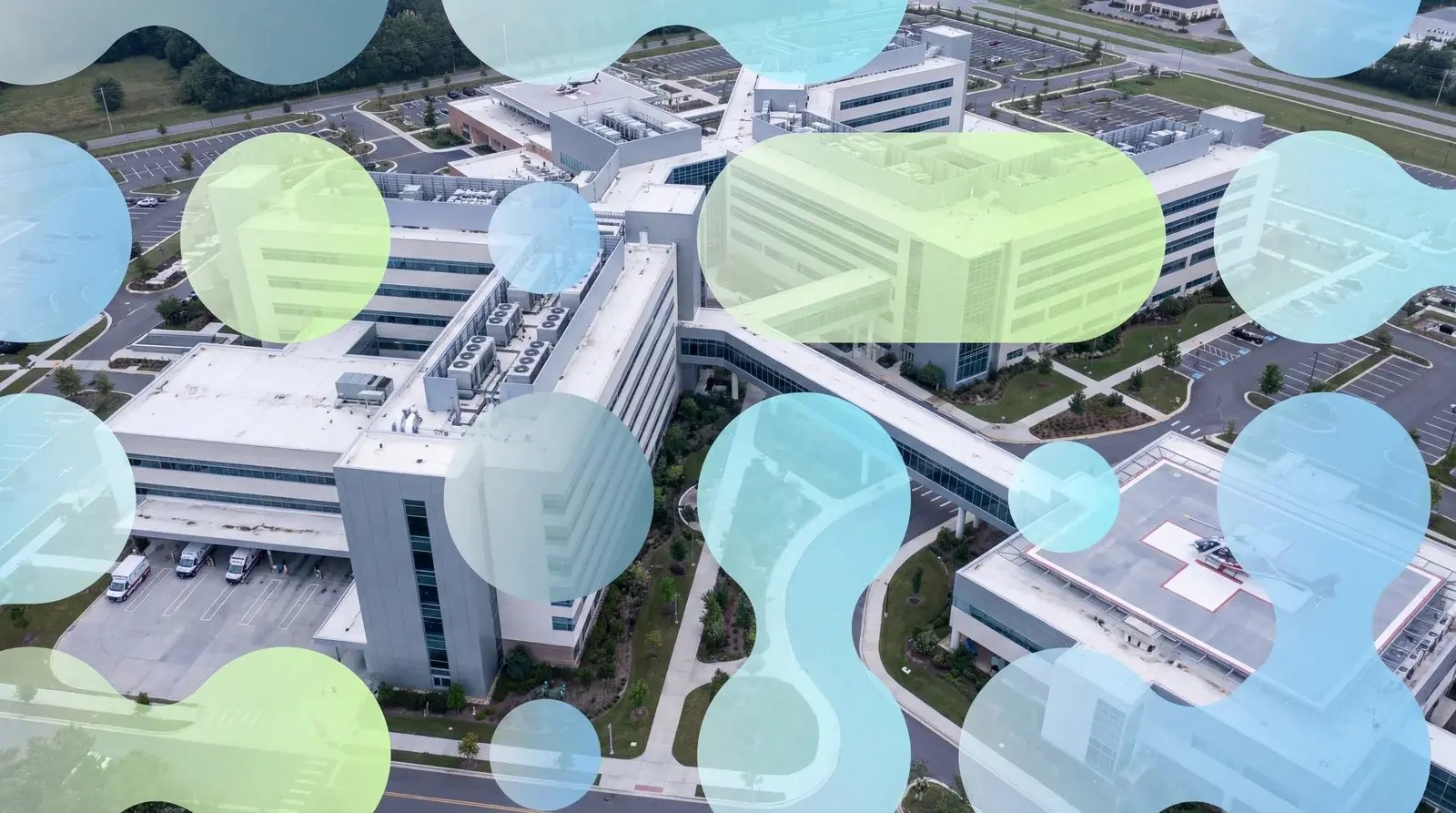 Aerial view of modern hospital campus with Elisity branded network node overlays representing top healthcare cybersecurity