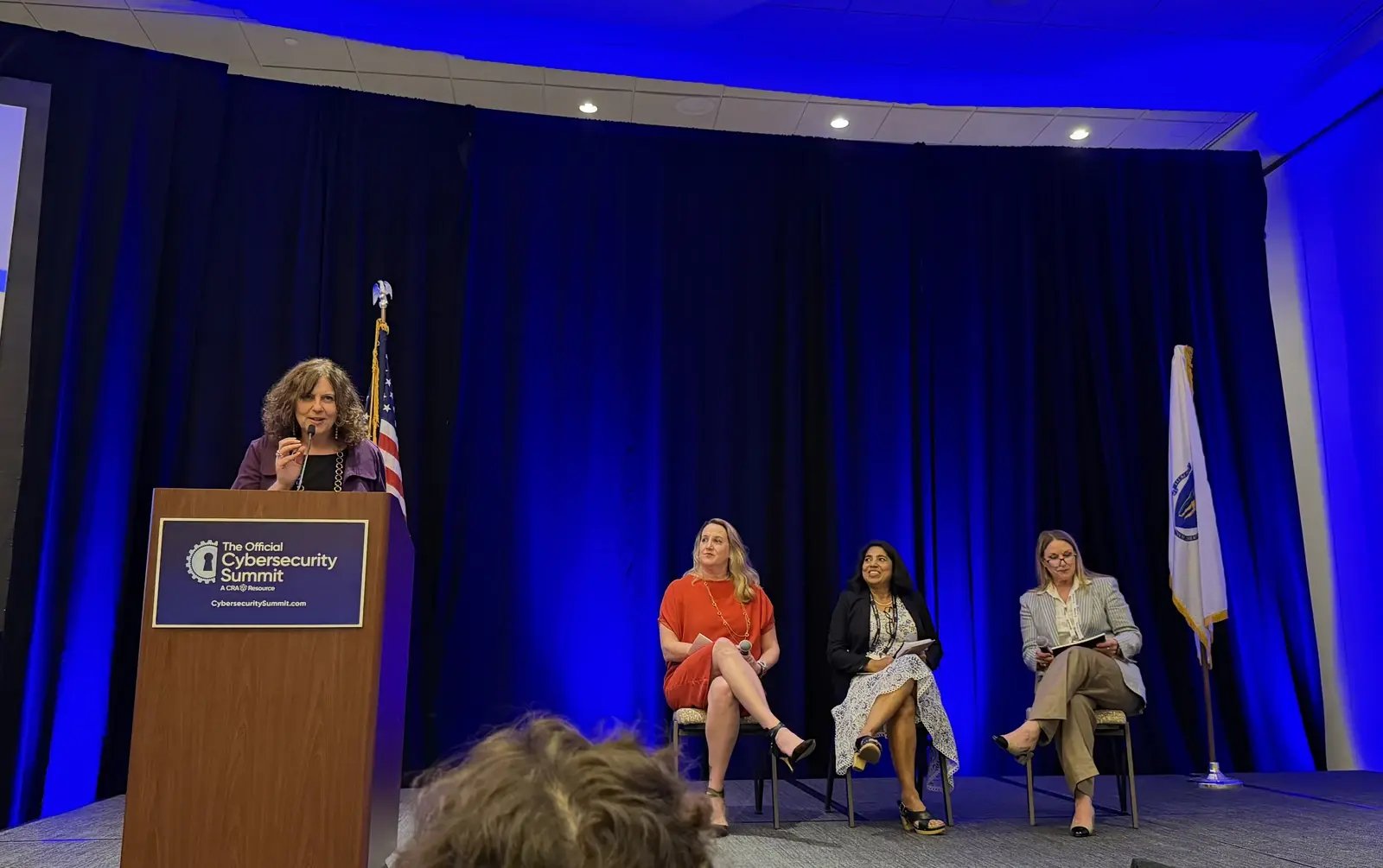Deidre Diamond moderating the Women in Cyber panel with Kelley Misata, Praveen Sharma, and Janine Comstock
