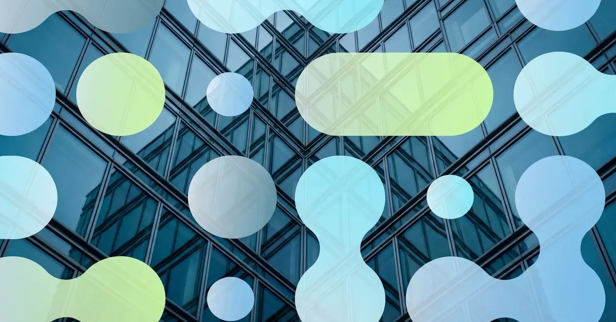 Modern glass building facade with geometric steel and glass grid divisions representing microsegmentation architecture